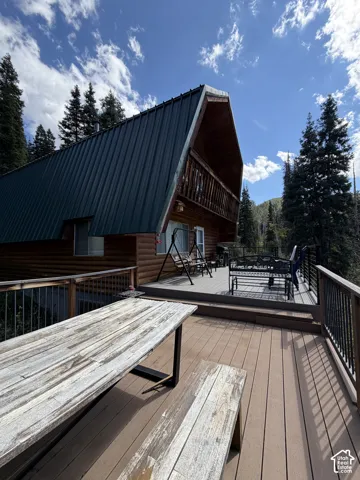 Expansive multi-level composite deck with dark railings