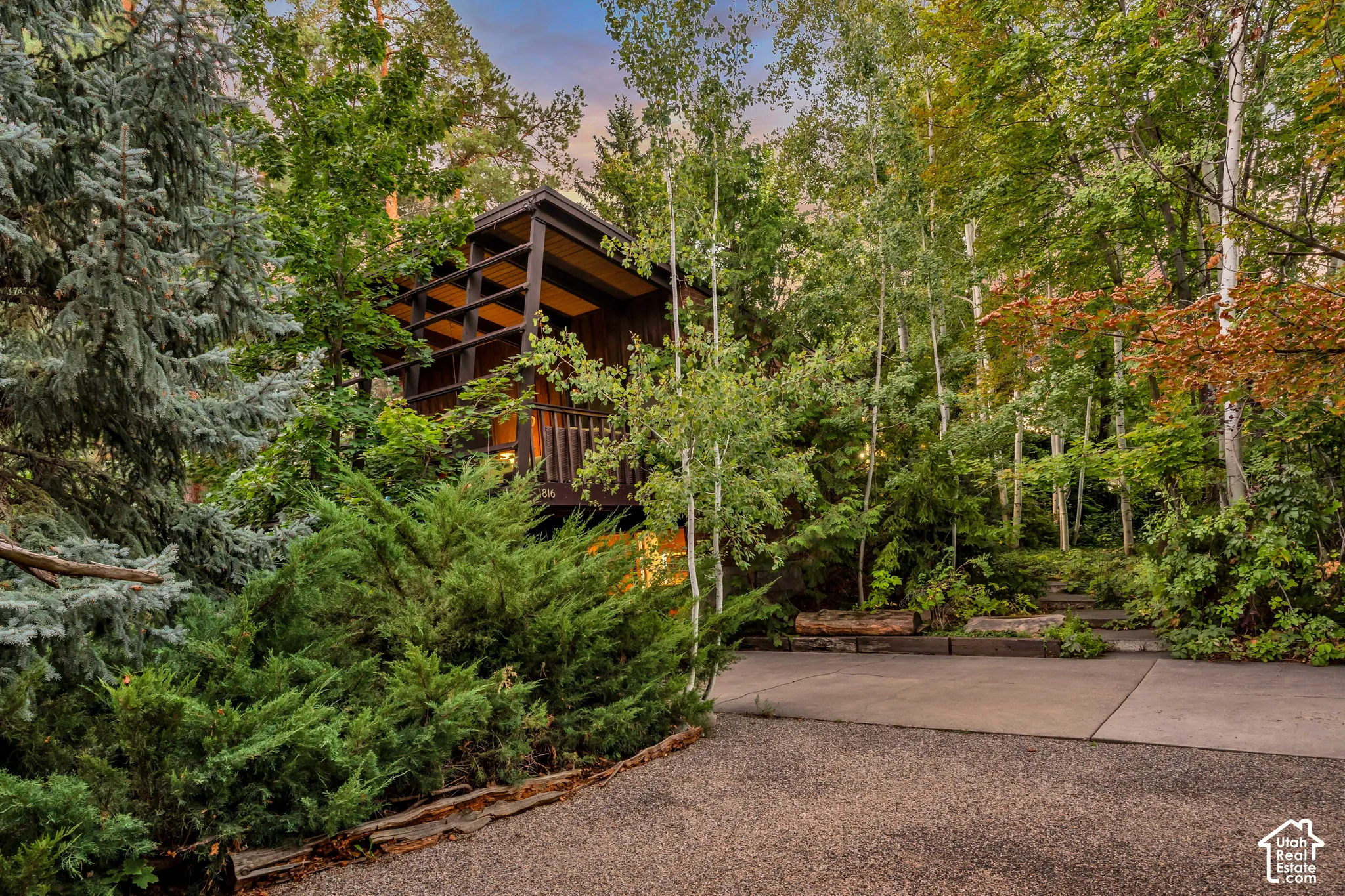 Elevated contemporary structure with wood siding