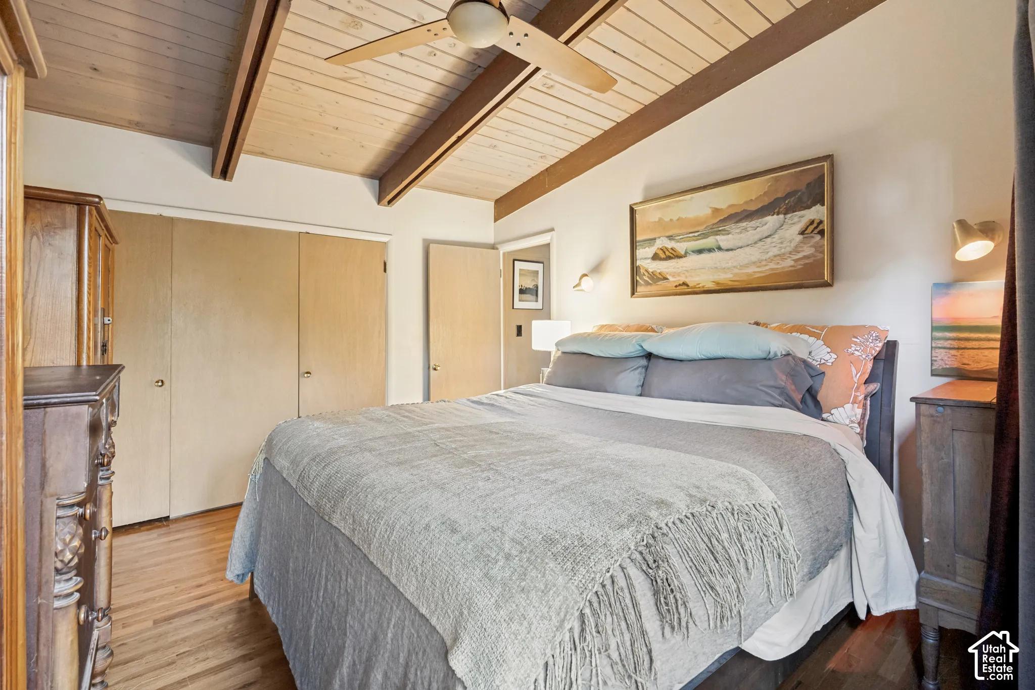 Wood-finish flooring with a multi-panel closet door
