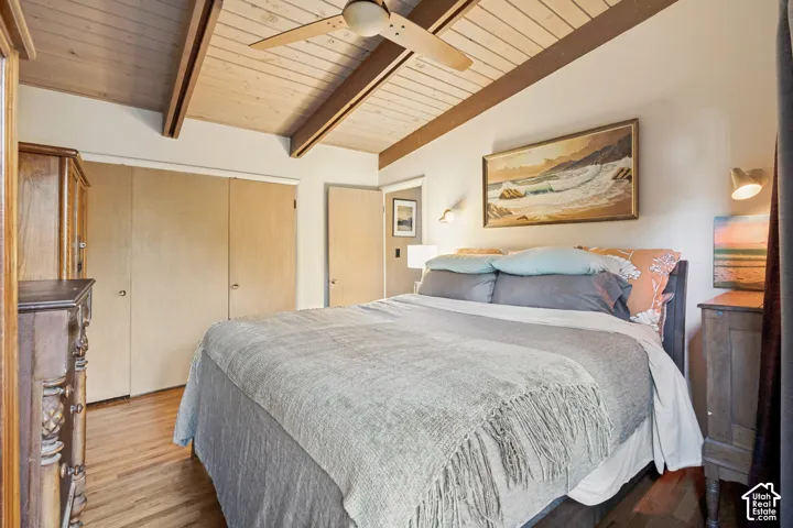 Wood-finish flooring with a multi-panel closet door