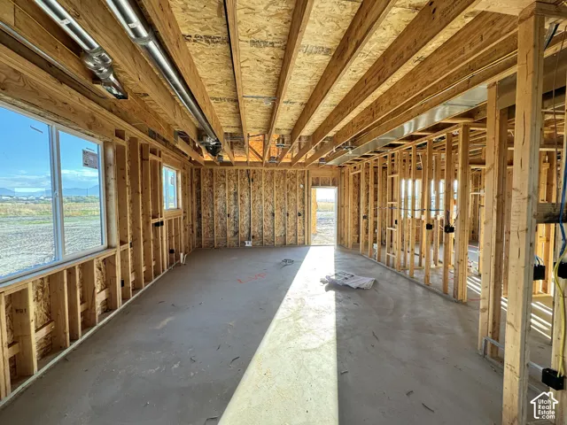 New construction framing with wood studs and open ceiling joists