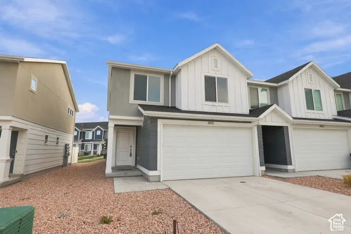 Modern two-story exterior with a two-car garage
