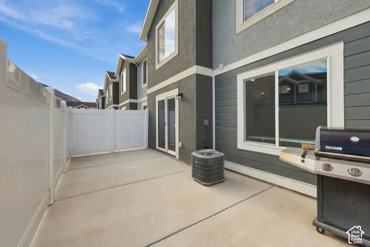 Private patio with a concrete surface