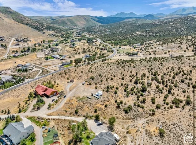 Expansive  landscape. Mature juniper and sage, level pad
