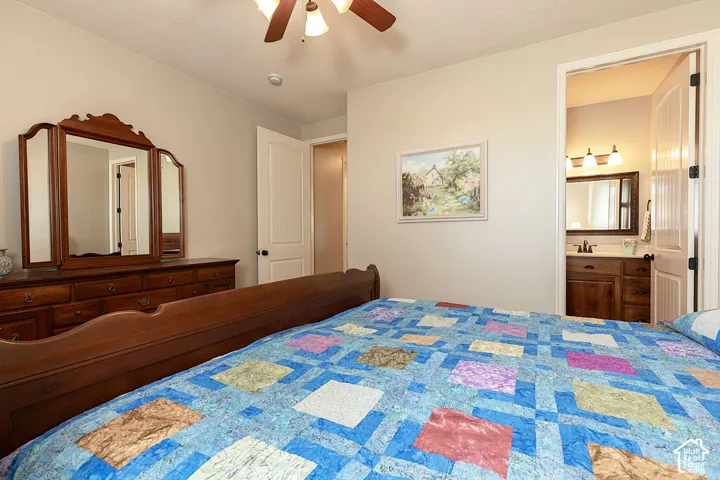 Recessed ceiling lighting, ceiling fan, solid core interior doors, and a vanity with an integrated sink