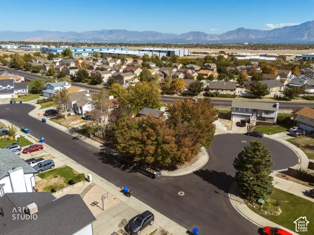 Residential neighborhood setting with clear skies and distant mountain scenery
