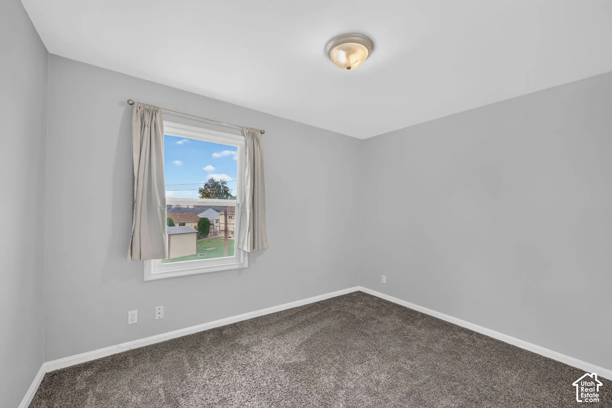 Recessed window featuring a white frame