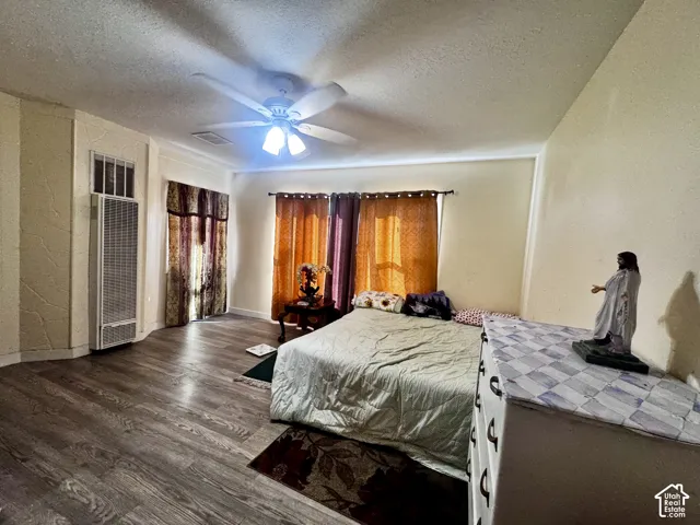 Bedroom # ONE, (no closet) with laminate flooring