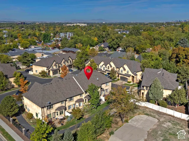 Townhome architecture with multi-level rooflines and exterior siding