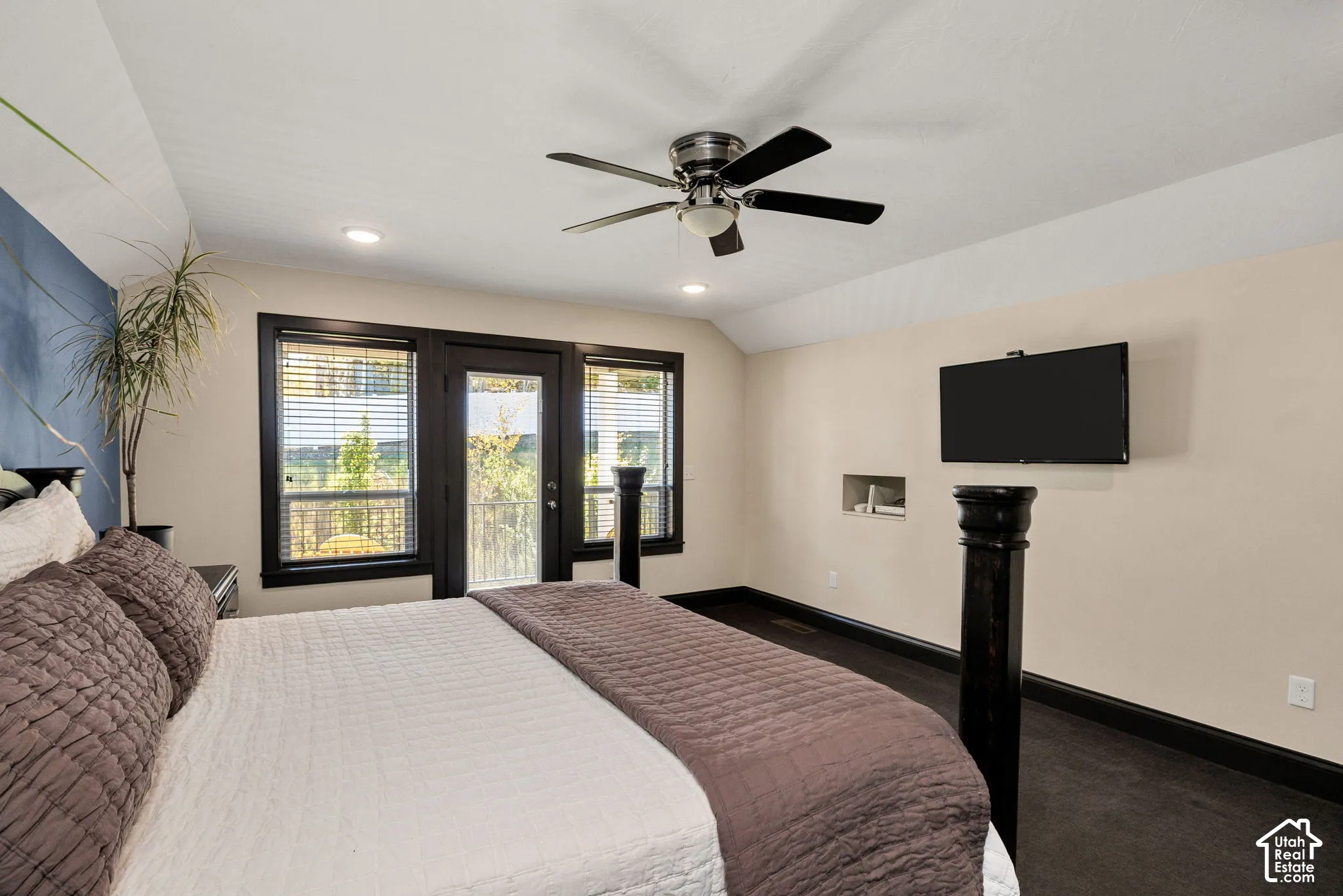 Dark wood-finish flooring with coordinating baseboards