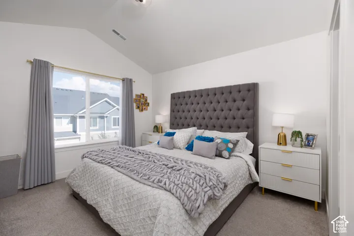Vaulted ceiling with a contemporary flush-mount light fixture