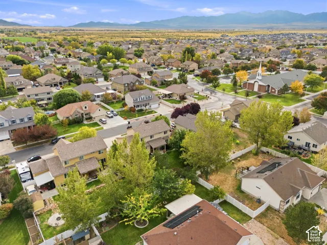 Expansive residential area featuring numerous single-family homes with pitched roofs and varying architectural styles