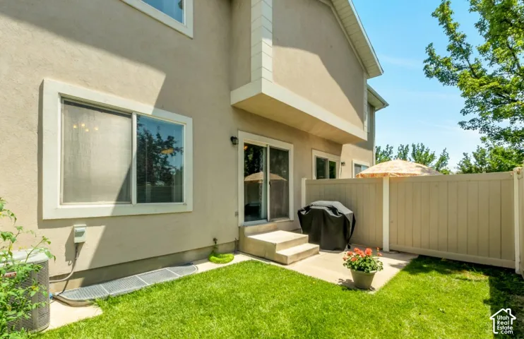 Private patio area with direct access to interior via sliding glass door