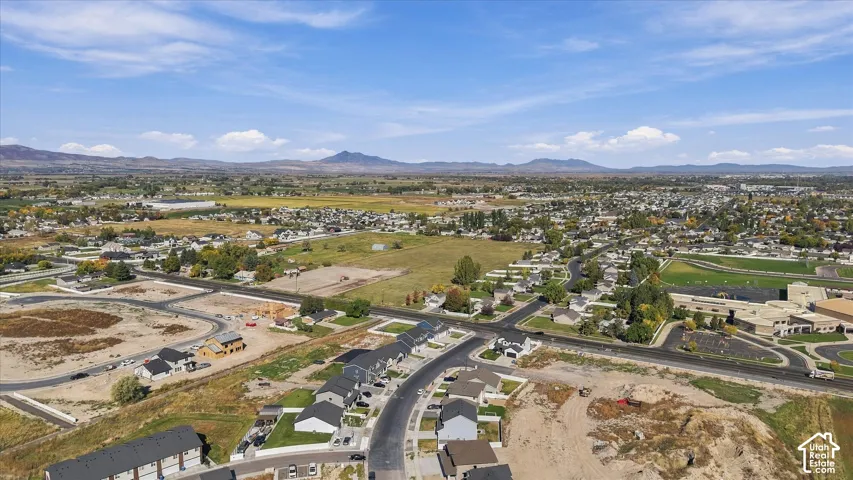 Developing neighborhood with established residential areas and undeveloped land parcels