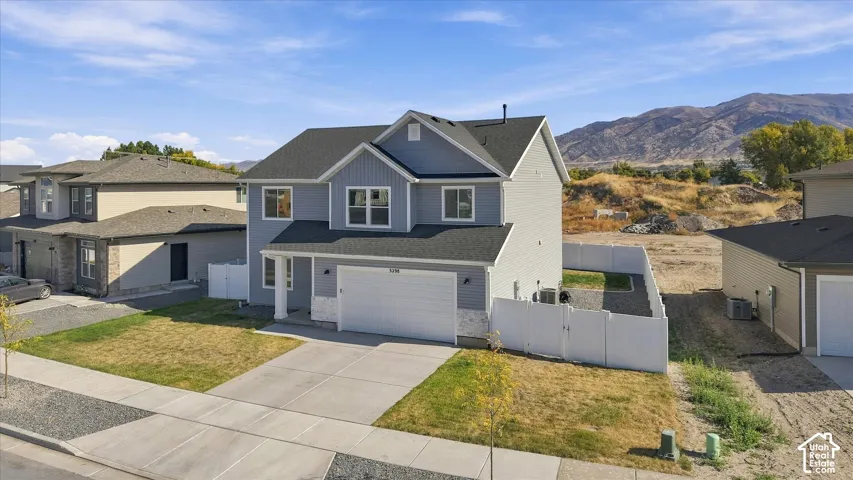 Two-story exterior with light blue siding and white trim