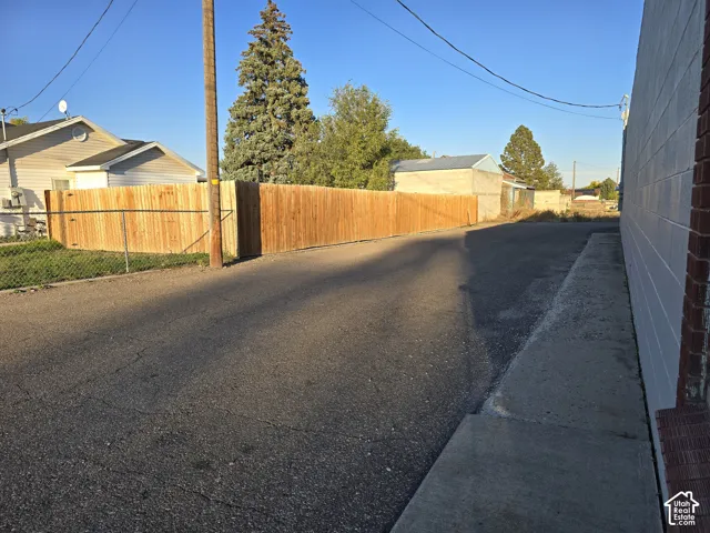 Wood privacy fence bordering the property