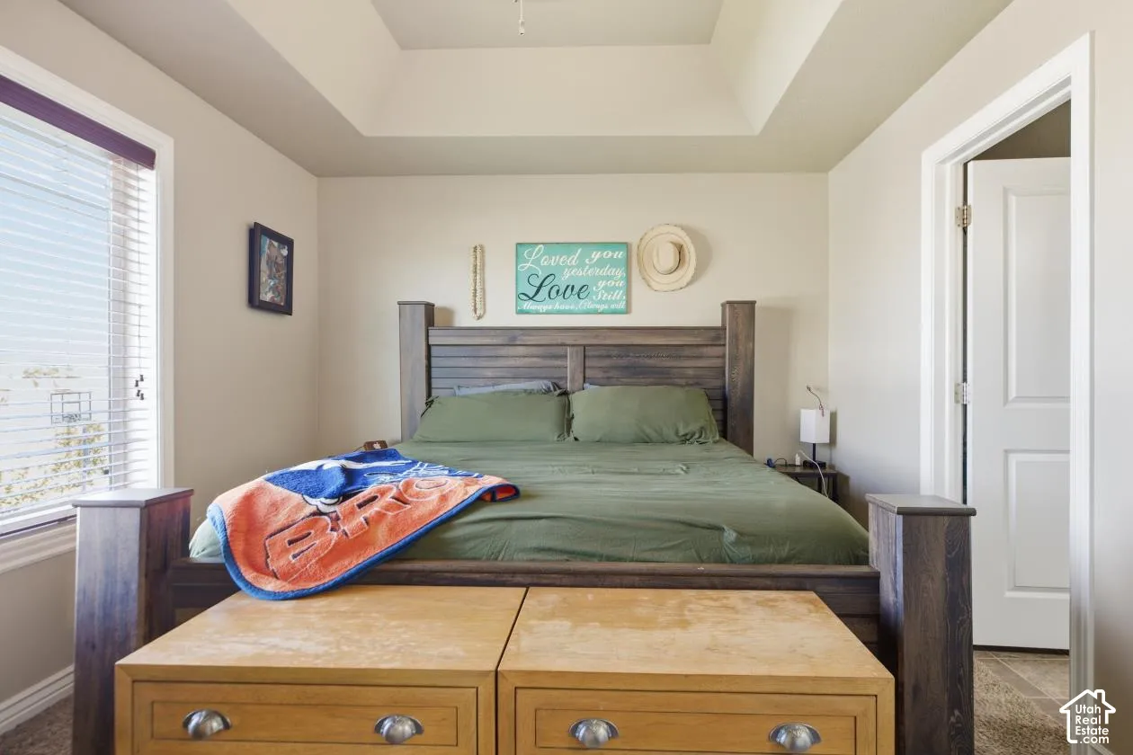 Tray ceiling accentuates the room's height