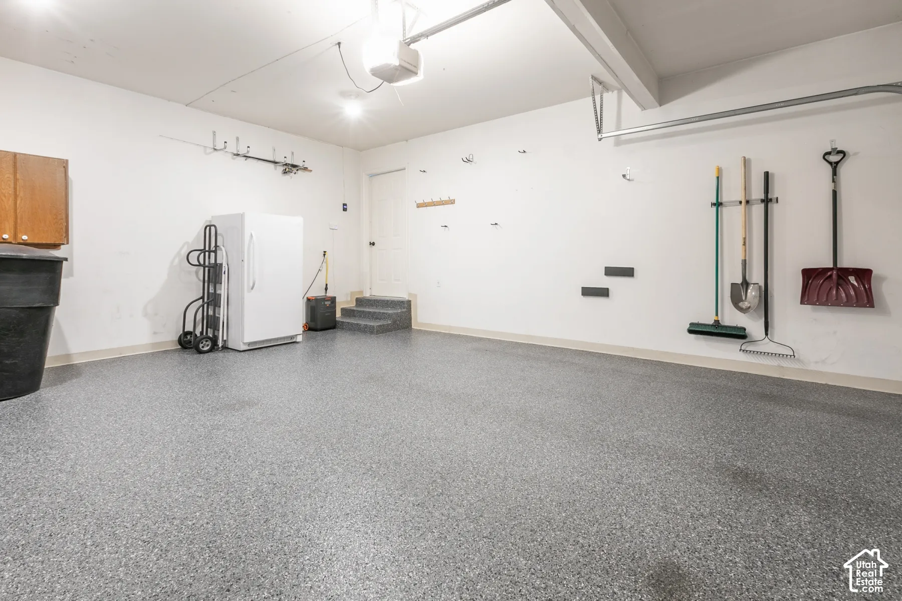 Epoxy-coated flooring and white painted walls