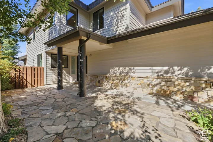 Exterior siding with stone veneer accents