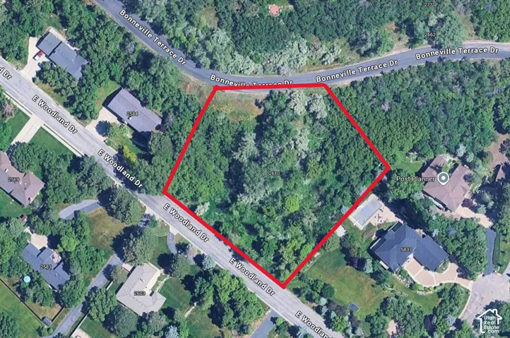 Aerial Property Photo.  Depicting the approx outlined parcel boundaries and surrounding residential context