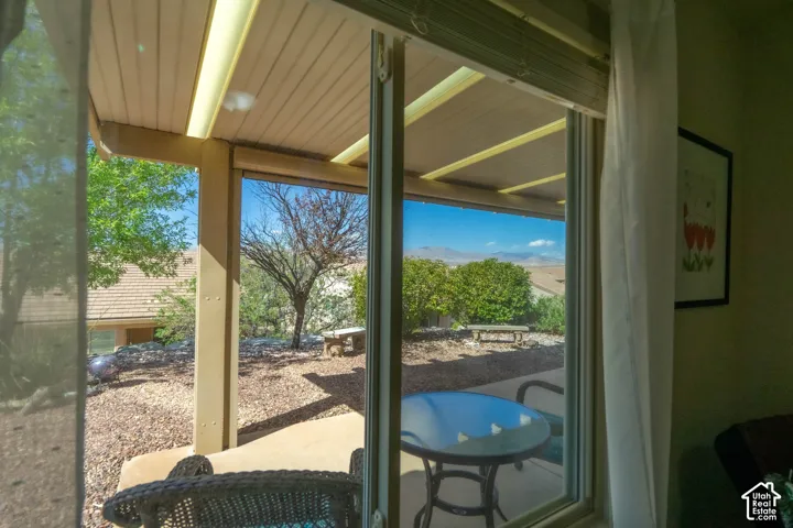 View from 2nd Bedroom, overlooking a xeriscaped yard