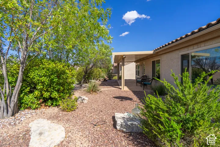 Expansive gravel landscaping with established foliage