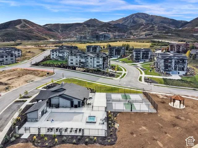 Community amenities include a multi-sport court, a swimming pool, and a hot tub