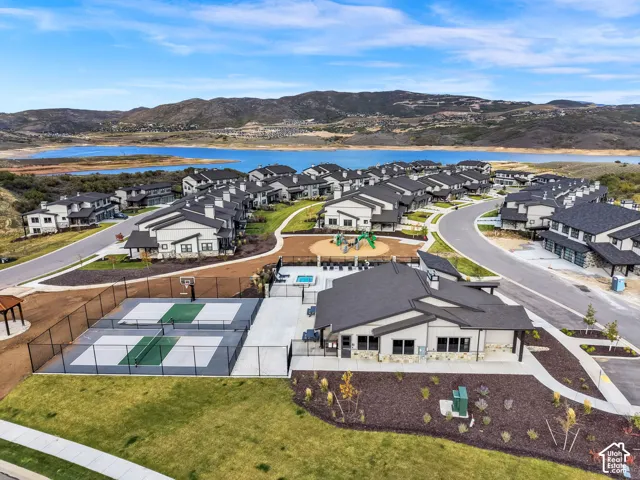 Community featuring a basketball court, pickleball courts, and a playground