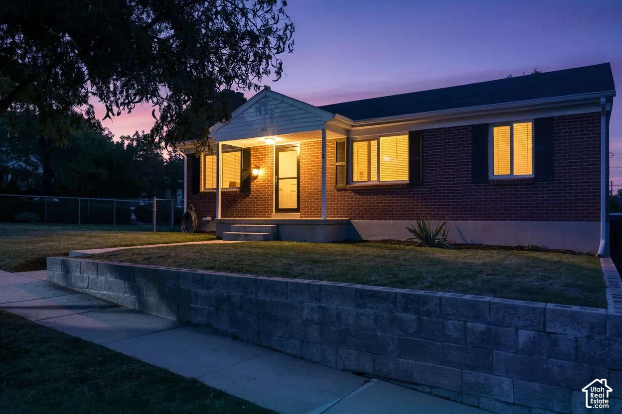 Brick exterior with a covered porch