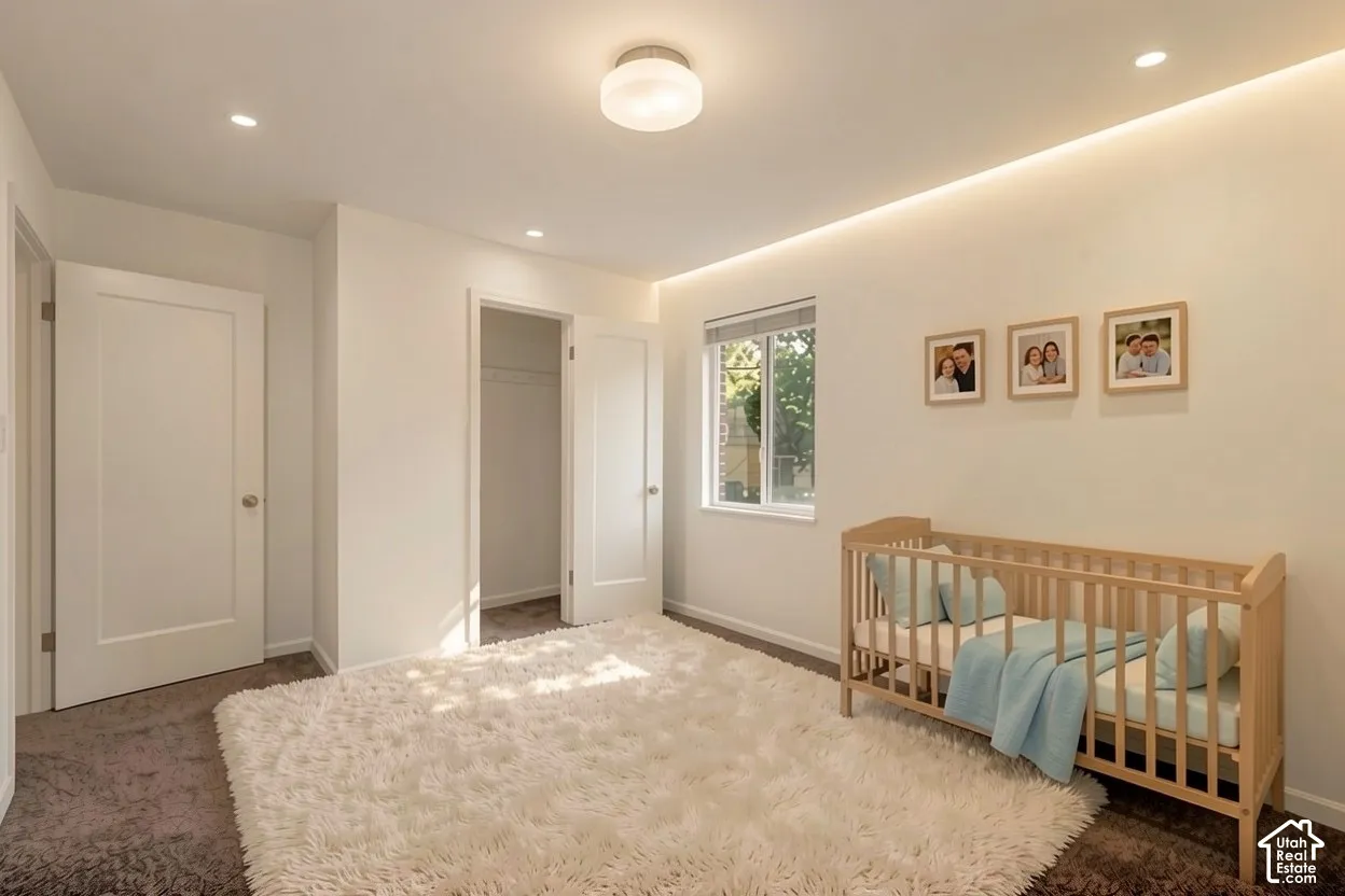 Recessed ceiling lighting, ceiling-mounted fixture, window with exterior view, and built-in closet