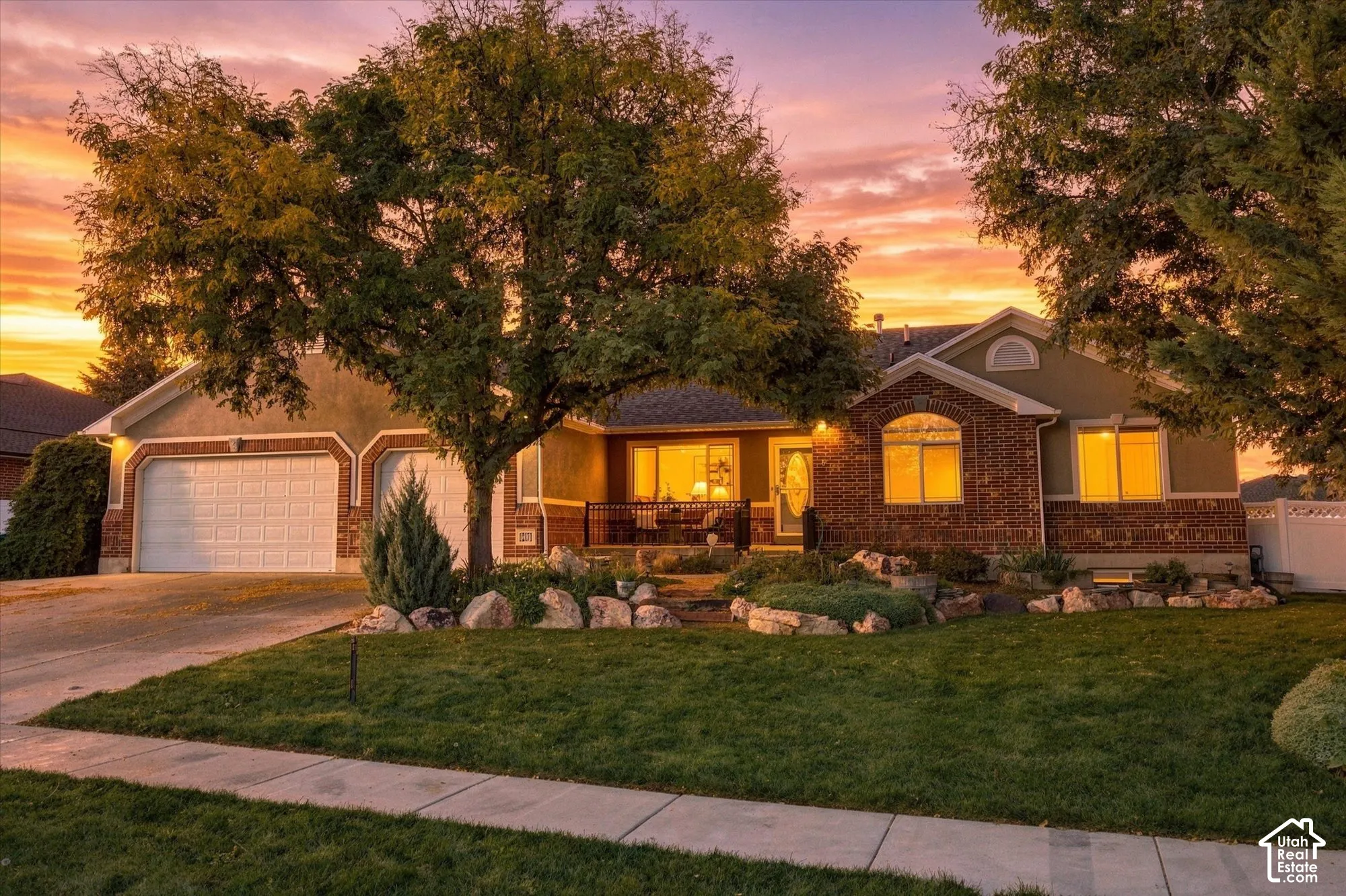 Brick and stucco exterior with an arched window accent