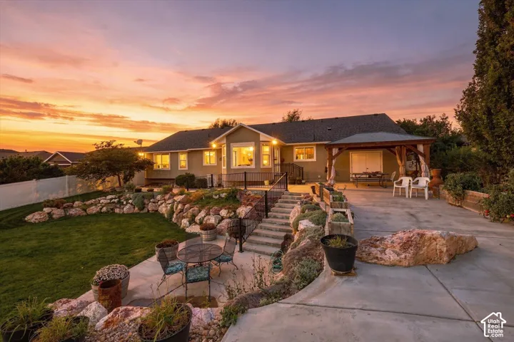 Expansive concrete patio with a covered outdoor area