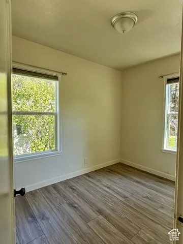Wood-finish flooring with white trim