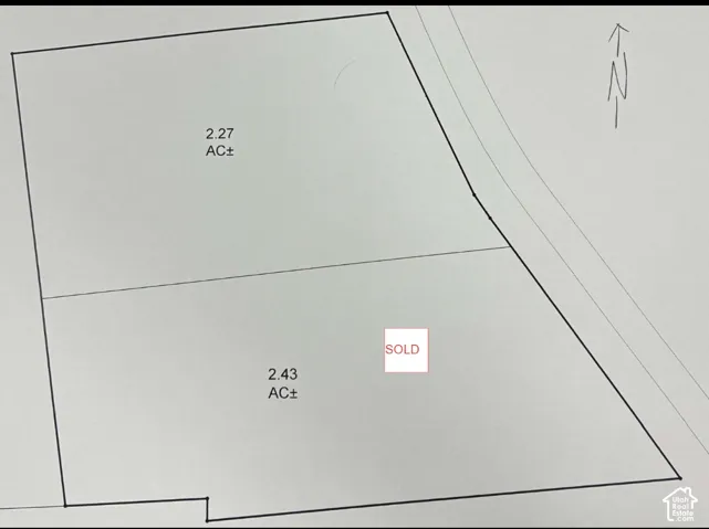Plat Map. Illustrating two distinct parcels of land with their respective acreage, one of which is marked as sold