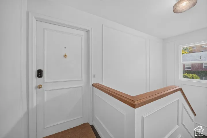 Panel molding accents the walls and stairwell