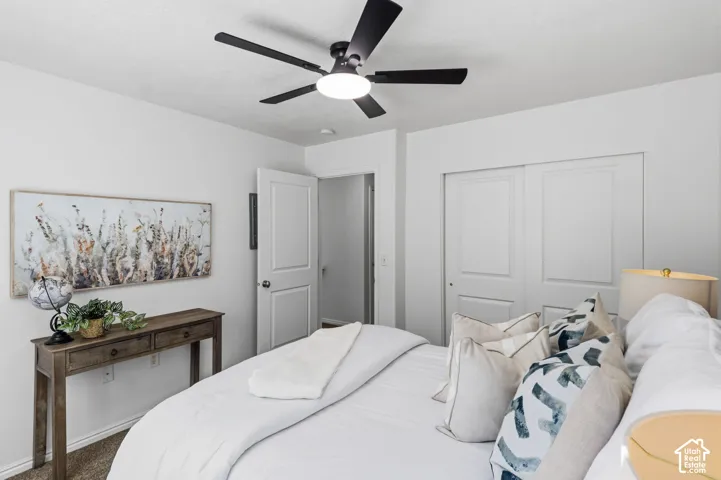 Neutral wall finishes, recessed lighting, and a contemporary ceiling fan