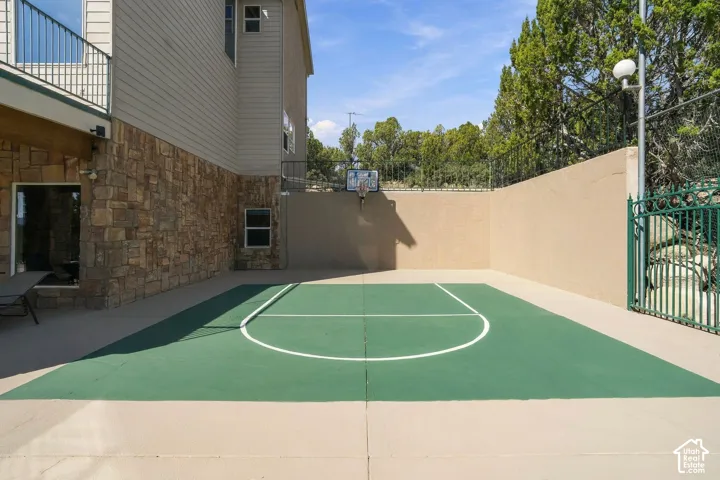 Dedicated sports court featuring a regulation-size soccer field with center line markings and goal areas, finished in durable synthetic surfacing