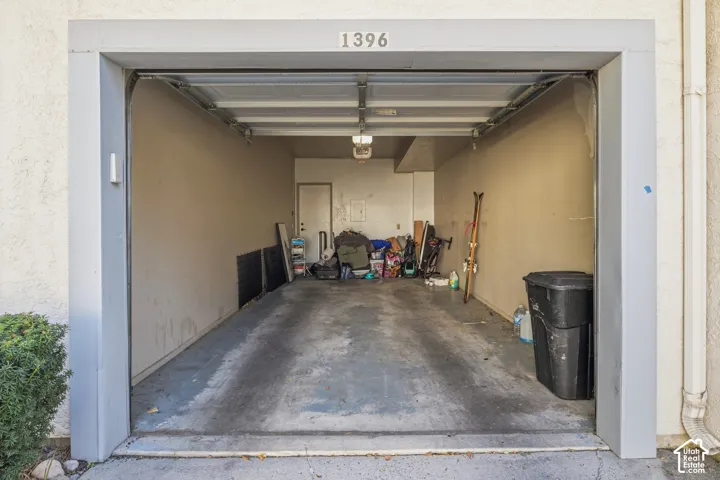 Attached single-vehicle garage with an overhead door
