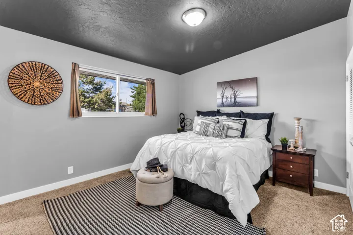 Primary bedroom with 3/4 private bathroom.