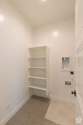 Laundry room in master closet