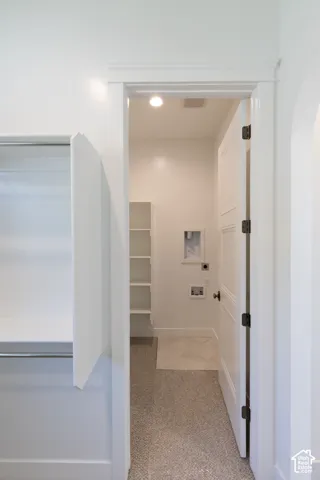 Laundry room in master closet