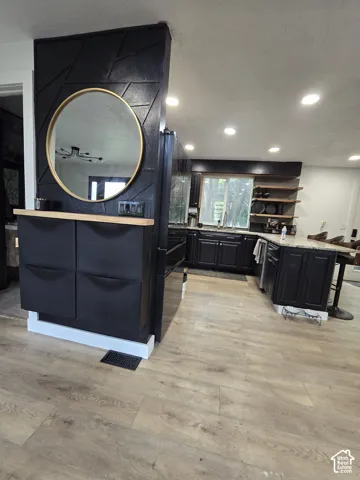 Wood-finish flooring throughout