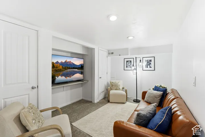 Recessed media niche with built-in shelving