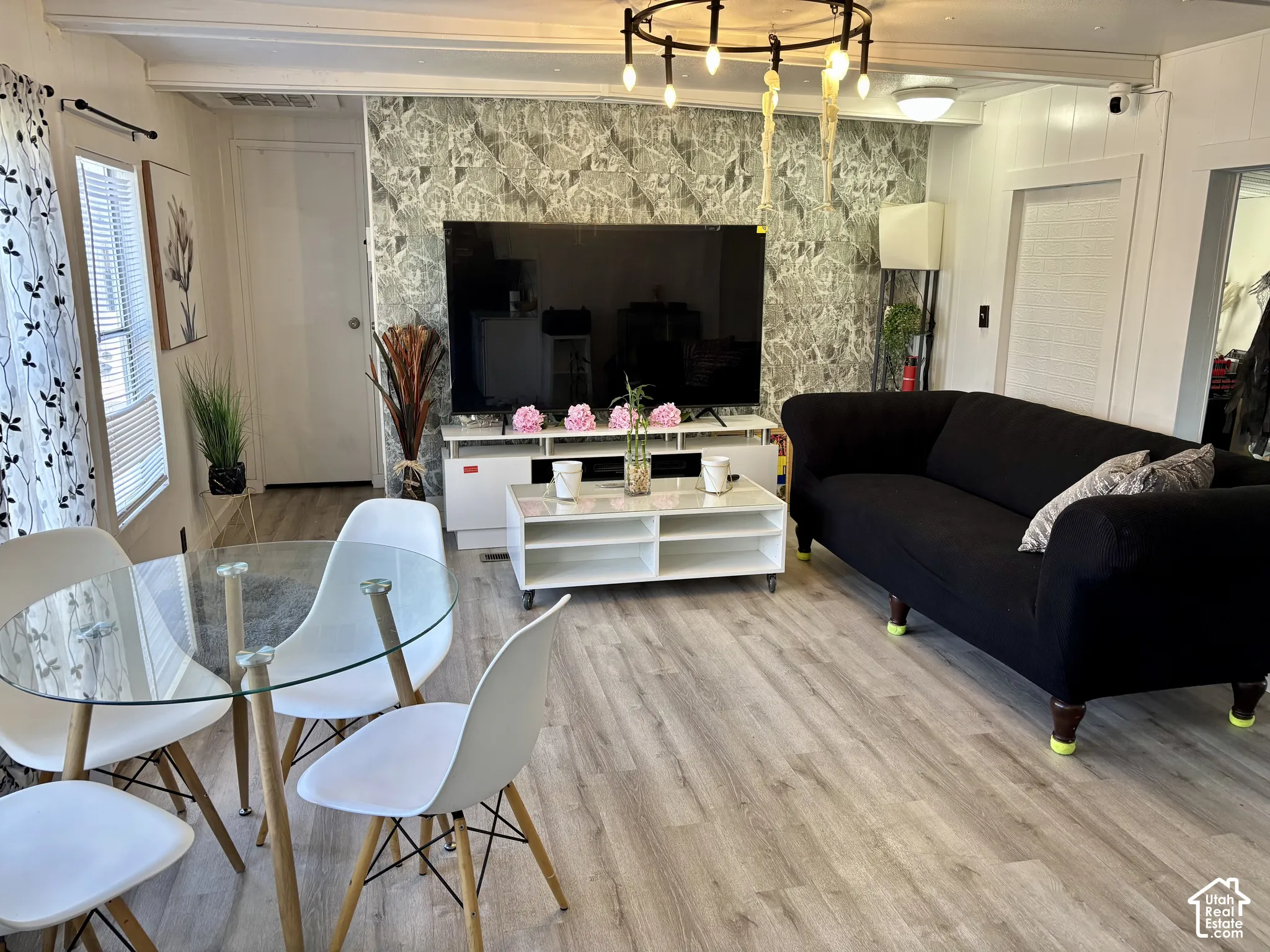 Wood-finish flooring throughout the space