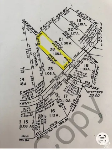Boundary Survey Plat. Delineating individual parcels with associated acreage and boundary dimensions for the property