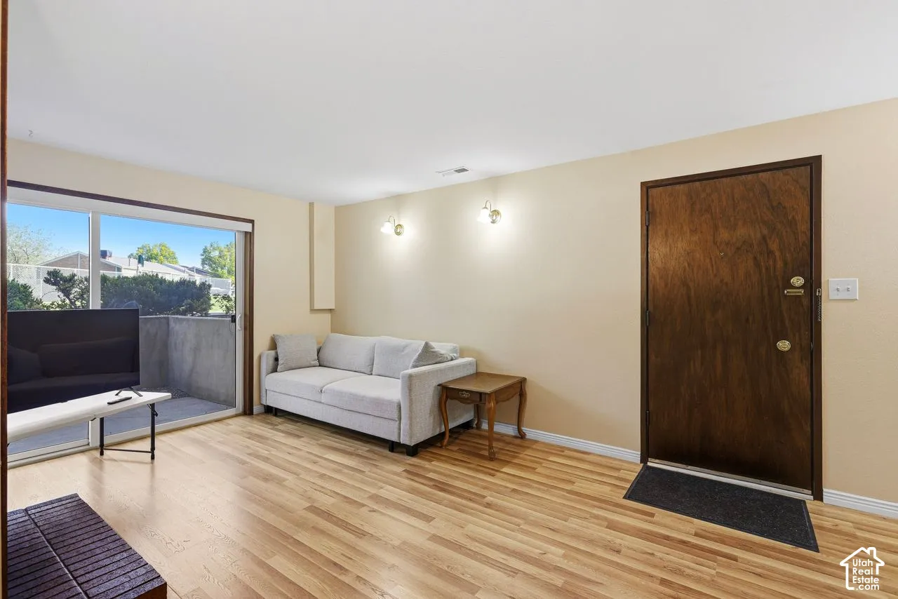 new Laminate flooring, sliding glass door, private patio,