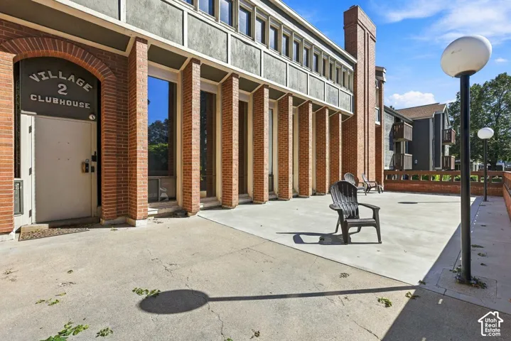 Brick exterior with archway entrance Leading to club House