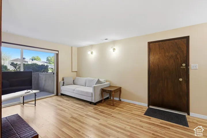 new Laminate flooring, sliding glass door, private patio,