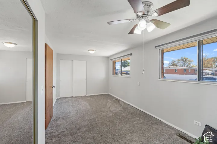 Recessed lighting, ceiling fan with light, and multiple windows for abundant natural light