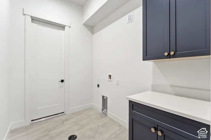 White shaker-style door with black hardware